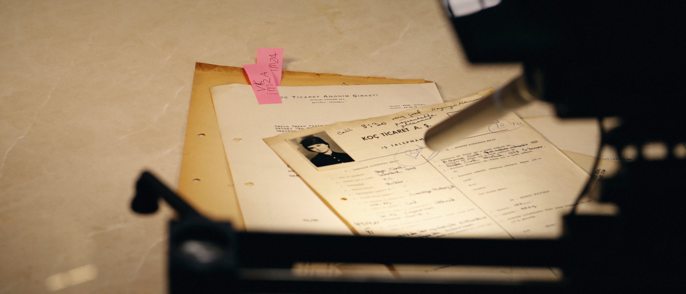 Camera on a slider over an archive document